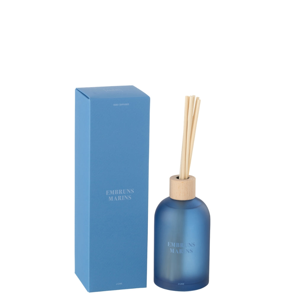 Geurstokjes Accords Essentiels Embruns Marins 250ml van J-Line, blauwe glazen fles met geurstokjes naast de geschenkdoos