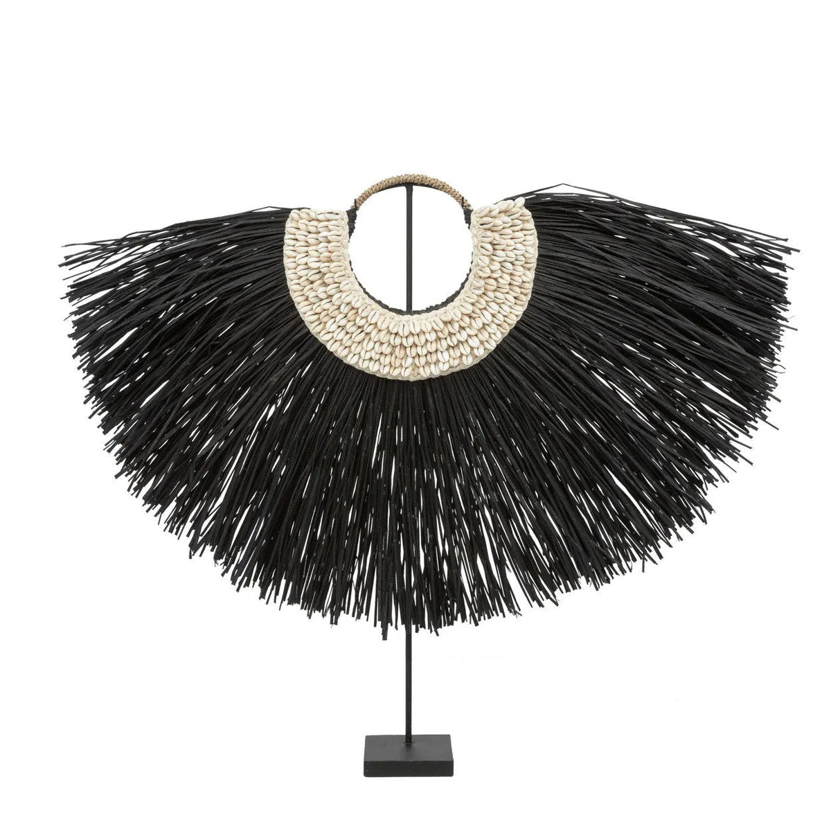 El Alang Cowrie de pie