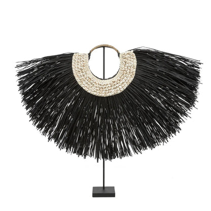 El Alang Cowrie de pie