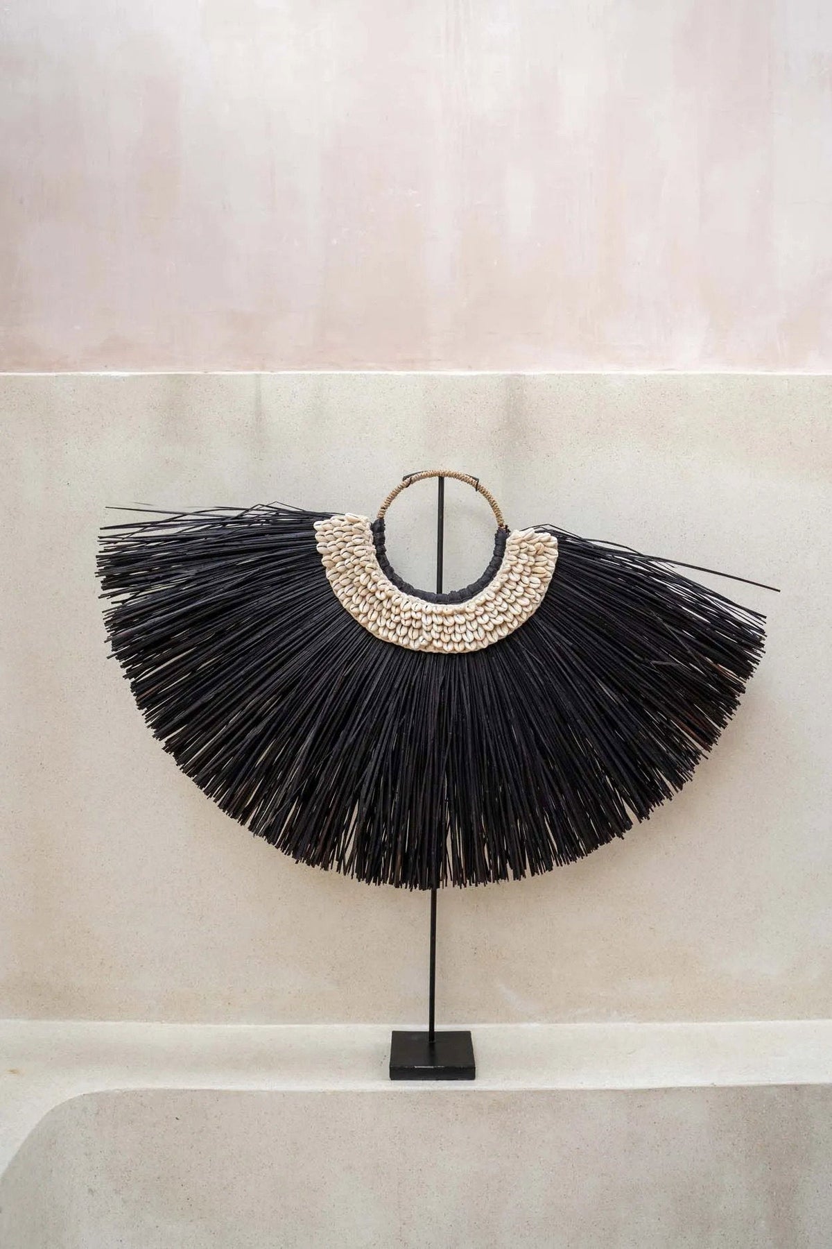 El Alang Cowrie de pie