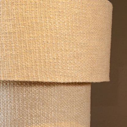 Detail Devi hanglamp van PTMD, twee lagen taupe stof met zichtbare weefstructuur