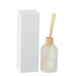 Geurstokjes Accords Essentiels Fleur Blanche 550ml van J-Line, witte glazen fles met geurstokjes naast de geschenkdoos