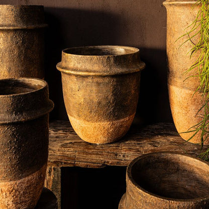 Set Van 3 Christenee Potten Grijs Bruin van PTMD, pot M gestyled met een plant